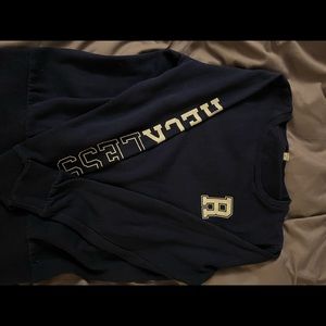 Young and reckless crew neck sweater